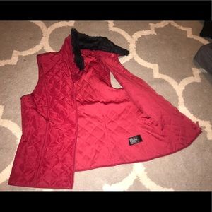 Fall/winter vest with fur collar.